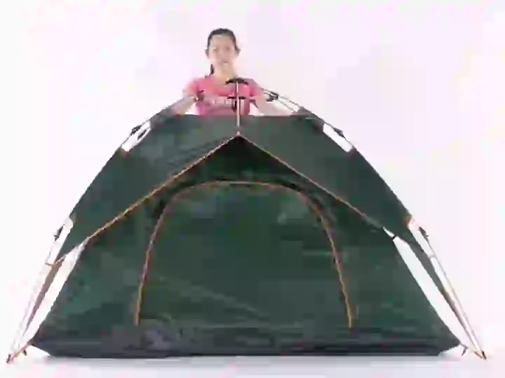 A Happy Travel pop-up tent pulled up from flat fabric into a pitched dome tent